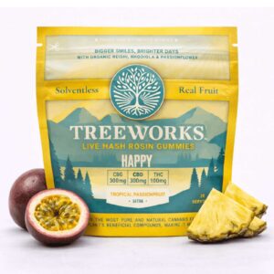 Bright yellow bag of Tree Works live hash rosin gummies, teal tree emblem, with passionfruit and pineapple slices placed beside it.